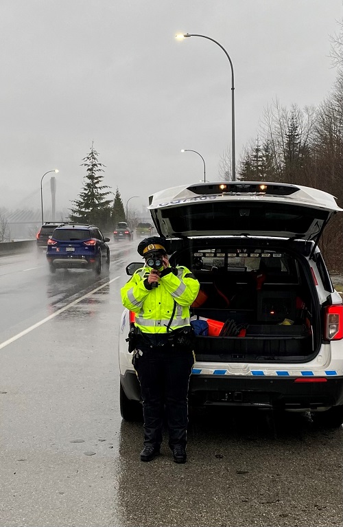 Cst. Tania Saunders conducting speed enforcement in the rain