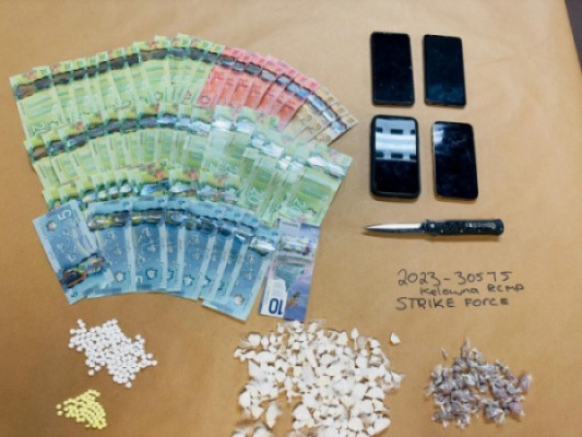 Table display of drugs and cash