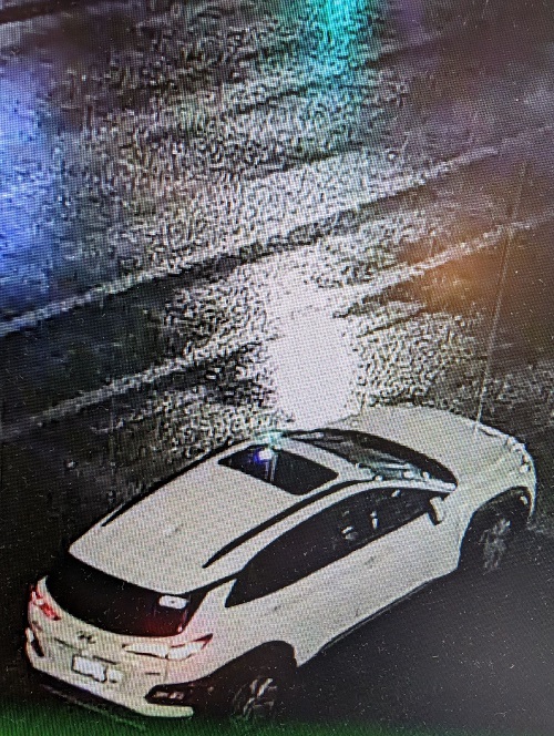 Surveillance video-still of suspect vehicle prior to collision