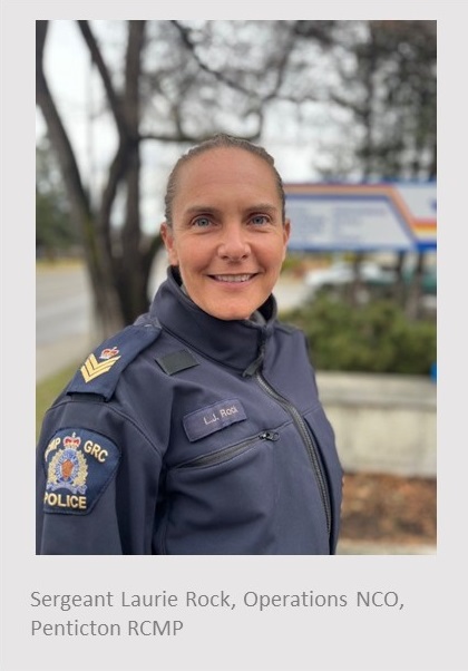 Caucasian female standing by an RCMP sign looking over her right shoulder. She is wearing a blue RCMP jacket. Text under the photo reads, Sergeant Laurie Rock, Operations NCO, Penicton RCMP.