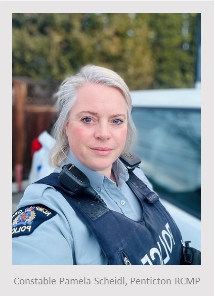 Caucasian female standing in front of a police vehicle wearing an RCMP uniform. Text under the photo reads, Constable  Pamela Scheidl, Penticton RCMP.